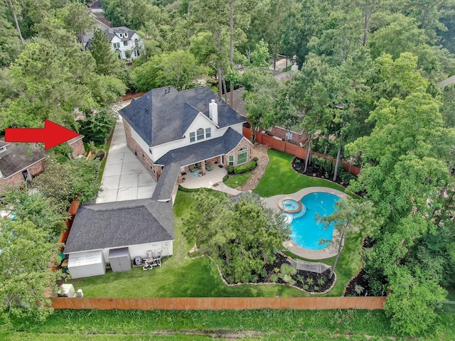 7 Newland Ct, The Woodlands, TX 77382 - aerial view of property and surrounding area featuring a pool