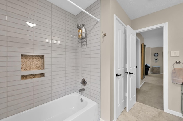 7 Newland Ct, The Woodlands, TX 77382 - full bath with washtub / shower combination, tile patterned floors, and baseboards
