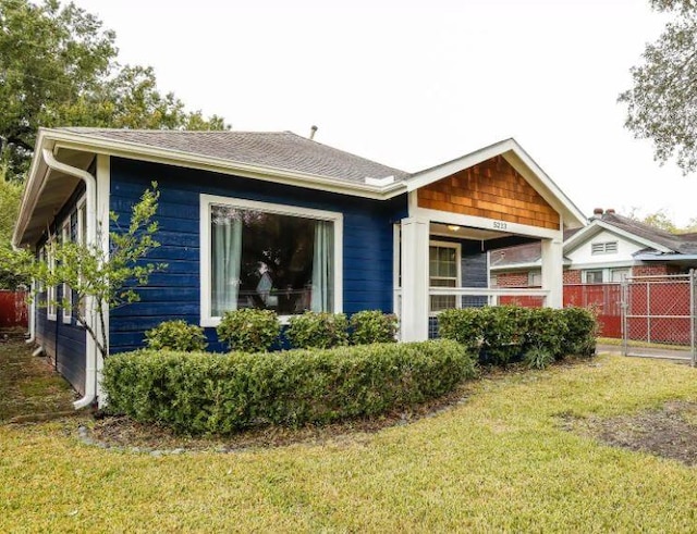 5213 Claremont St, Houston, TX 77023 - back of property with a shingled roof