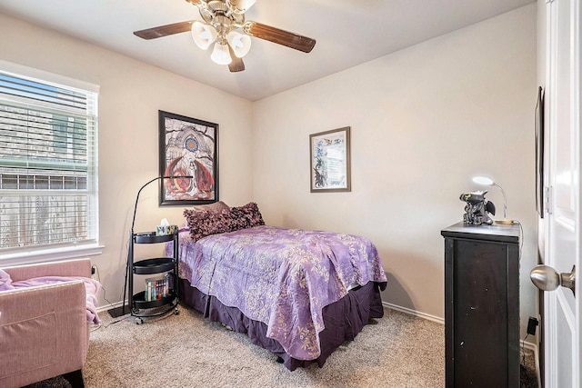 9521 Mountain Maple Pl, Conroe, TX 77385 - bedroom featuring carpet floors, baseboards, and a ceiling fan