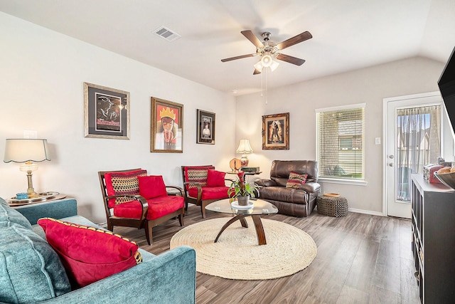 9521 Mountain Maple Pl, Conroe, TX 77385 - living area featuring wood finished floors, ceiling fan, and baseboards