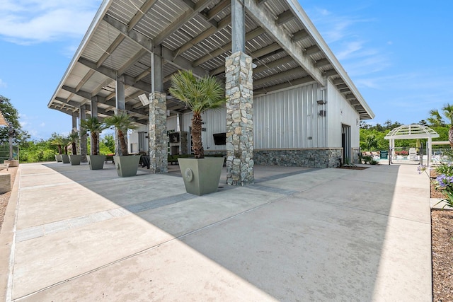 9521 Mountain Maple Pl, Conroe, TX 77385 - view of home's community with a patio area