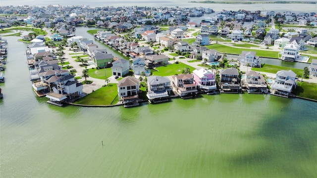 1554 Windsong Way, Tiki Island, TX 77554 - aerial perspective of suburban area featuring a nearby body of water
