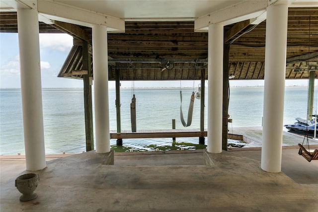 1554 Windsong Way, Tiki Island, TX 77554 - dock area featuring boat lift and a water view