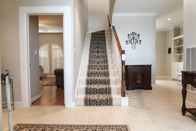 1554 Windsong Way, Tiki Island, TX 77554 - stairway featuring crown molding, built in features, baseboards, tile patterned flooring, and recessed lighting