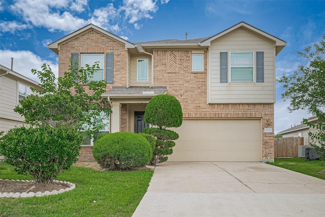 3722 Glover Meadows Ln, Houston, TX 77047 - view of front of home featuring an attached garage, brick siding, concrete driveway, and central AC unit