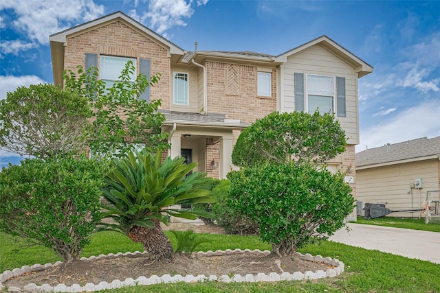 3722 Glover Meadows Ln, Houston, TX 77047 - view of front of house featuring brick siding and driveway