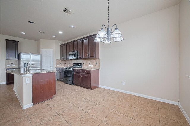 3722 Glover Meadows Ln, Houston, TX 77047 - kitchen featuring appliances with stainless steel finishes, a chandelier, backsplash, recessed lighting, and light tile patterned flooring