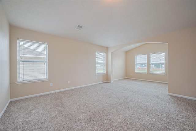 3722 Glover Meadows Ln, Houston, TX 77047 - carpeted spare room featuring baseboards and arched walkways