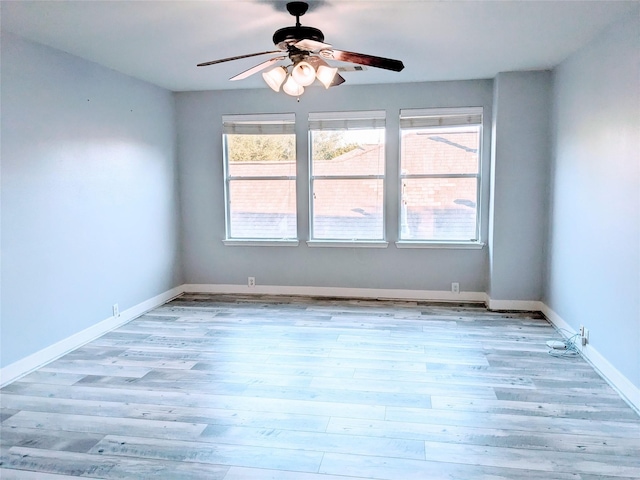 6318 Alpine Trail Ln, Katy, TX 77494 - unfurnished room featuring ceiling fan, wood finished floors, and baseboards