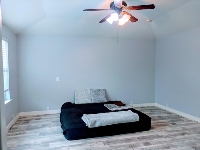 6318 Alpine Trail Ln, Katy, TX 77494 - living area featuring vaulted ceiling, wood finished floors, ceiling fan, and baseboards