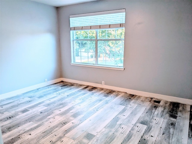 6318 Alpine Trail Ln, Katy, TX 77494 - unfurnished room featuring wood finished floors and baseboards