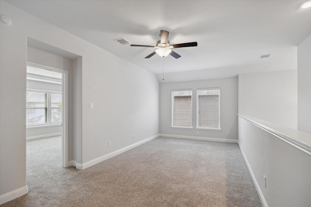 12 Centennial Ridge Pl, Magnolia, TX 77354 - empty room featuring light colored carpet, a ceiling fan, and baseboards