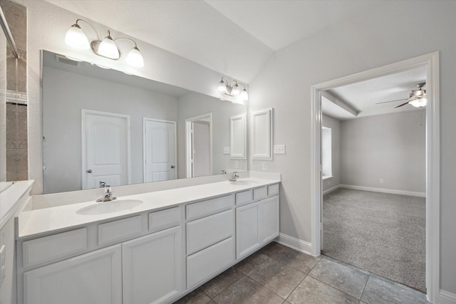 12 Centennial Ridge Pl, Magnolia, TX 77354 - bathroom with double vanity, a ceiling fan, baseboards, and vaulted ceiling