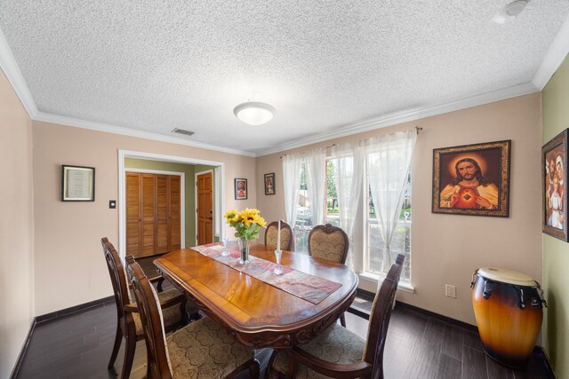 19527 Enchanted Spring Dr, Spring, TX 77388 - dining area with dark wood-style floors, baseboards, ornamental molding, and a textured ceiling