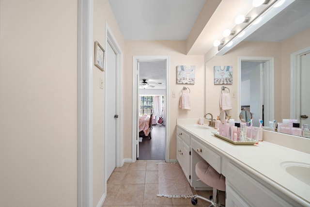 19527 Enchanted Spring Dr, Spring, TX 77388 - full bathroom featuring ensuite bathroom, double vanity, tile patterned flooring, baseboards, and a ceiling fan