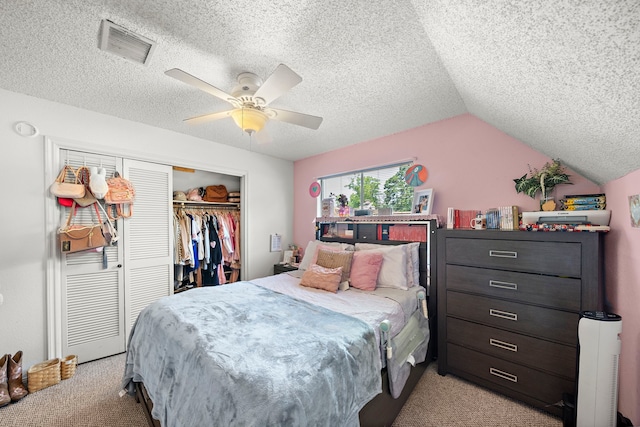19527 Enchanted Spring Dr, Spring, TX 77388 - bedroom featuring light colored carpet, a closet, lofted ceiling, a textured ceiling, and a ceiling fan