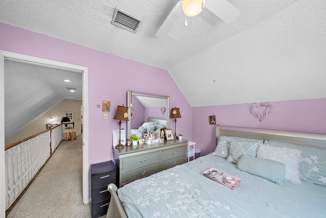 19527 Enchanted Spring Dr, Spring, TX 77388 - bedroom featuring lofted ceiling, carpet floors, ceiling fan, and a textured ceiling