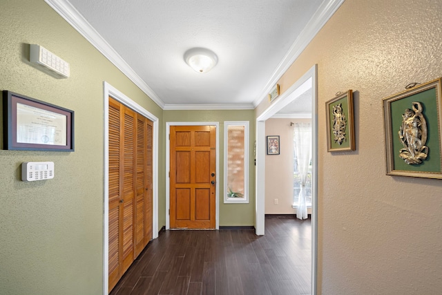 19527 Enchanted Spring Dr, Spring, TX 77388 - entryway with ornamental molding, dark wood-style flooring, baseboards, and a textured wall