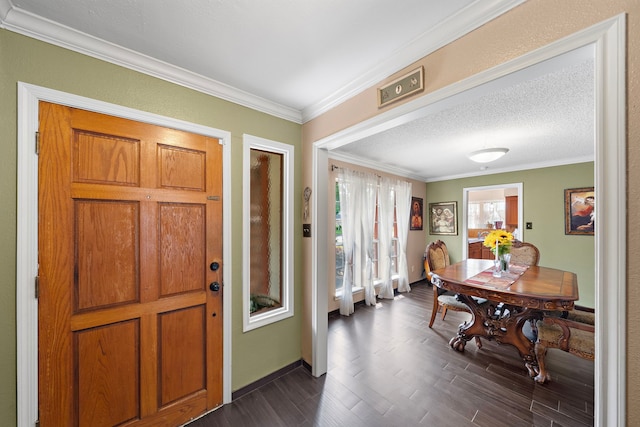 19527 Enchanted Spring Dr, Spring, TX 77388 - entryway with crown molding, dark wood-type flooring, and baseboards