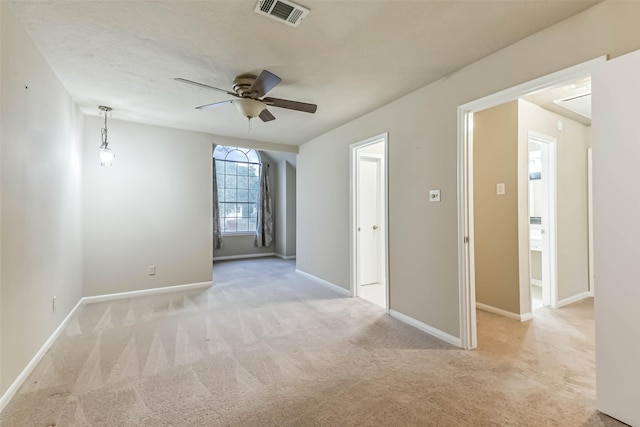 3914 Cherry Forest Dr, Houston, TX 77088 - unfurnished room featuring a ceiling fan, light carpet, and baseboards