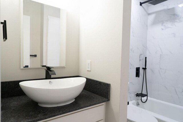 2243 W Alabama St Unit 10, Houston, TX 77098 - bathroom featuring vanity and shower / bathtub combination