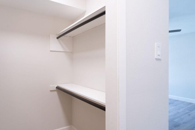 2243 W Alabama St Unit 10, Houston, TX 77098 - spacious closet featuring wood finished floors