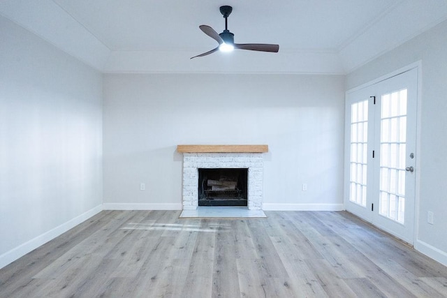 2243 W Alabama St Unit 10, Houston, TX 77098 - unfurnished living room with plenty of natural light, wood finished floors, baseboards, and crown molding