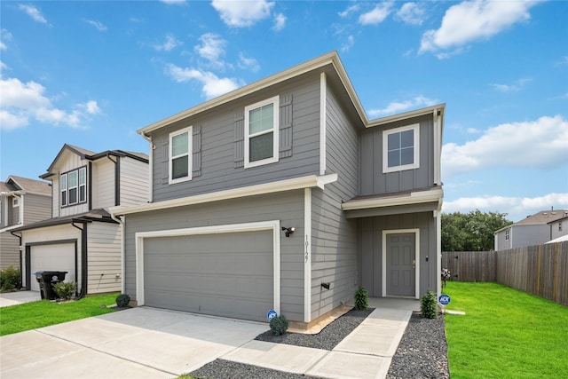 10127 Clearwick St, Houston, TX 77034 - view of front facade with board and batten siding, a garage, and driveway