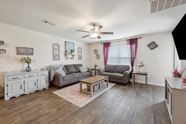 6011 Treasure Cove Rd, Cove, TX 77523 - living room with wood finished floors, a ceiling fan, and baseboards