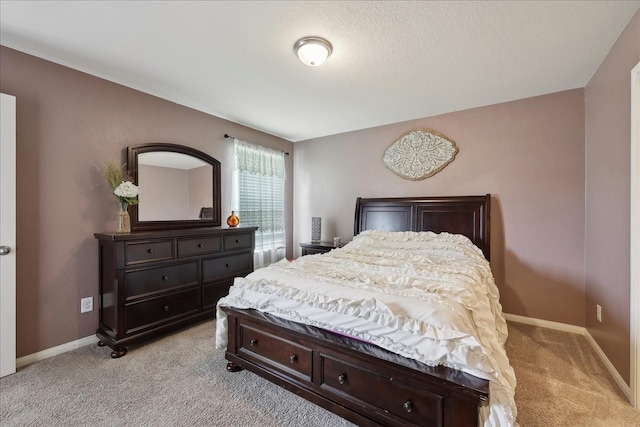 6011 Treasure Cove Rd, Cove, TX 77523 - bedroom with light colored carpet and baseboards