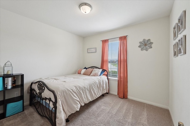 6011 Treasure Cove Rd, Cove, TX 77523 - bedroom with carpet flooring and baseboards