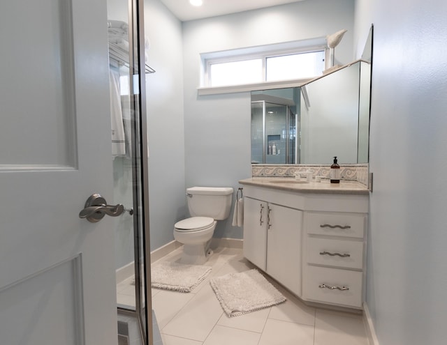 1827 Port O Call St, Tiki Island, TX 77554 - bathroom featuring vanity, toilet, tile patterned flooring, and baseboards