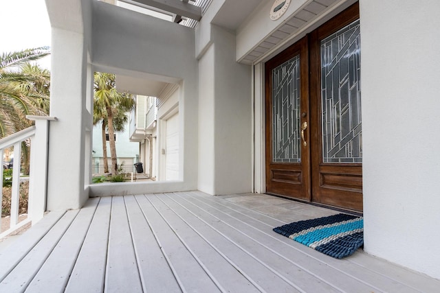 1827 Port O Call St, Tiki Island, TX 77554 - entrance to property with french doors and stucco siding