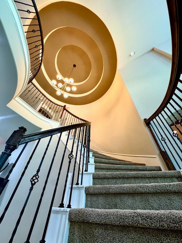 7739 Augusta Creek Ct, Spring, TX 77389 - stairway with a chandelier
