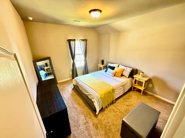 7739 Augusta Creek Ct, Spring, TX 77389 - carpeted bedroom with vaulted ceiling and baseboards