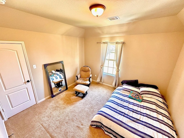 7739 Augusta Creek Ct, Spring, TX 77389 - carpeted bedroom featuring a textured ceiling and baseboards