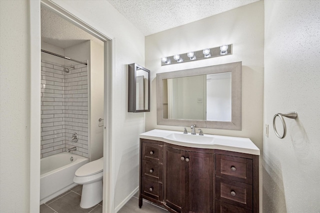 6701 Sands Point Dr Unit 129, Houston, TX 77074 - bathroom with toilet, vanity, tile patterned flooring, shower / washtub combination, and a textured ceiling