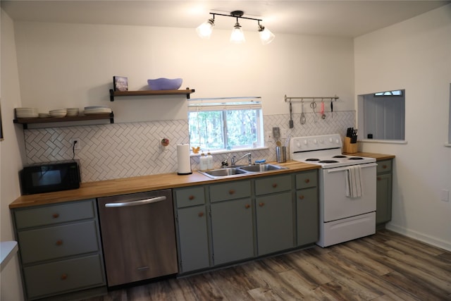 465 Creek Dr, Onalaska, TX 77360 - kitchen featuring stainless steel dishwasher, electric range, a sink, black microwave, and open shelves