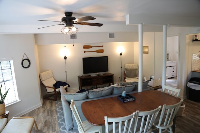 465 Creek Dr, Onalaska, TX 77360 - dining space featuring wood finished floors, ceiling fan, and baseboards