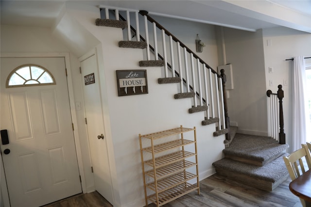 465 Creek Dr, Onalaska, TX 77360 - entryway featuring wood finished floors, stairway, and baseboards