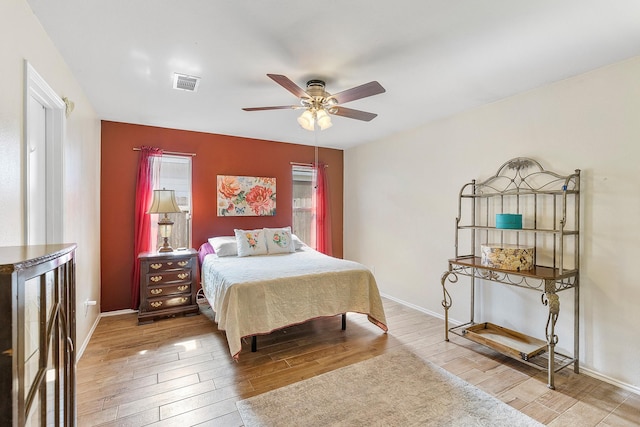 414 Laurel Sage Dr, Houston, TX 77339 - bedroom featuring hardwood / wood-style floors and baseboards