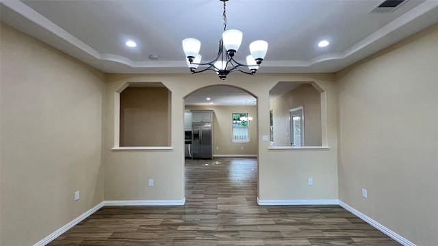 712 Lettie St, Richmond, TX 77469 - unfurnished dining area featuring a raised ceiling, a chandelier, baseboards, wood finished floors, and recessed lighting