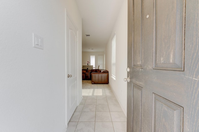 5022 Jonina Ln, Houston, TX 77048 - hallway with light tile patterned floors