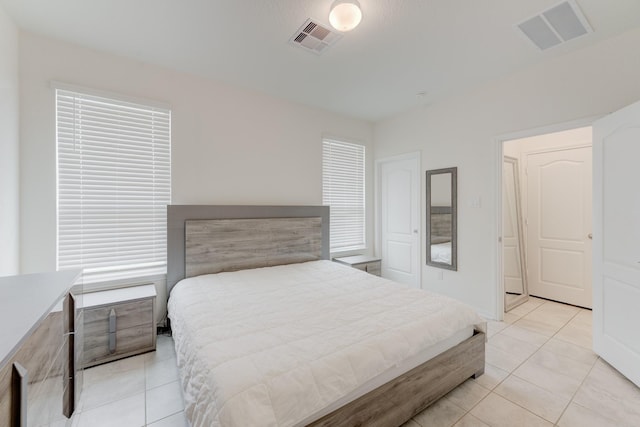 5022 Jonina Ln, Houston, TX 77048 - bedroom with light tile patterned flooring
