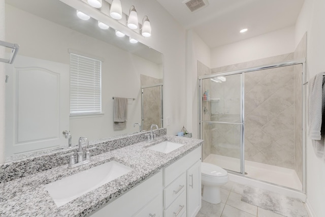 5022 Jonina Ln, Houston, TX 77048 - full bath featuring toilet, tile patterned floors, a stall shower, and double vanity