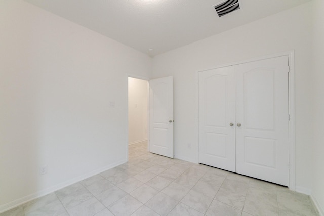 5022 Jonina Ln, Houston, TX 77048 - unfurnished bedroom featuring a closet and baseboards