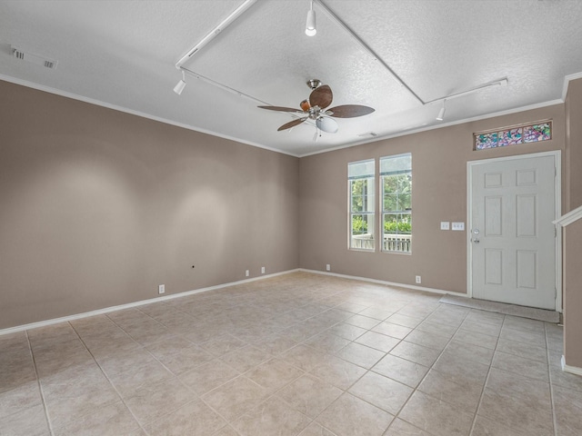 2031 Upland Hill St, Spring, TX 77373 - empty room with attic access, rail lighting, a ceiling fan, a textured ceiling, and crown molding