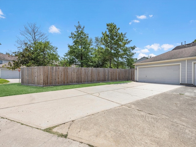 2031 Upland Hill St, Spring, TX 77373 - garage featuring concrete driveway
