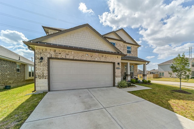 356 Selah Ct, Alvin, TX 77511 - view of front of property featuring a front yard, driveway, brick siding, and an attached garage